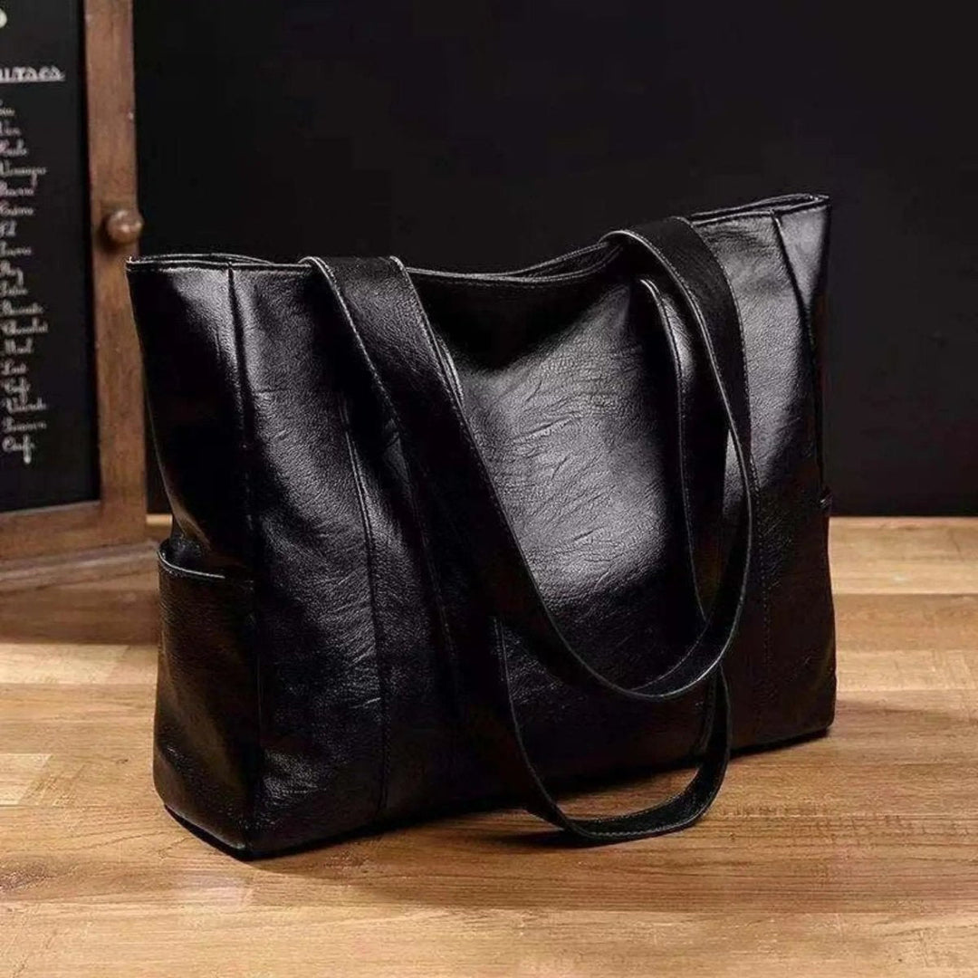 Women's classic shoulder tote bag, great for everyday, travel, or a sophisticated work look.