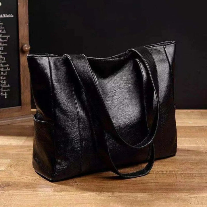 Women's classic shoulder tote bag, great for everyday, travel, or a sophisticated work look.