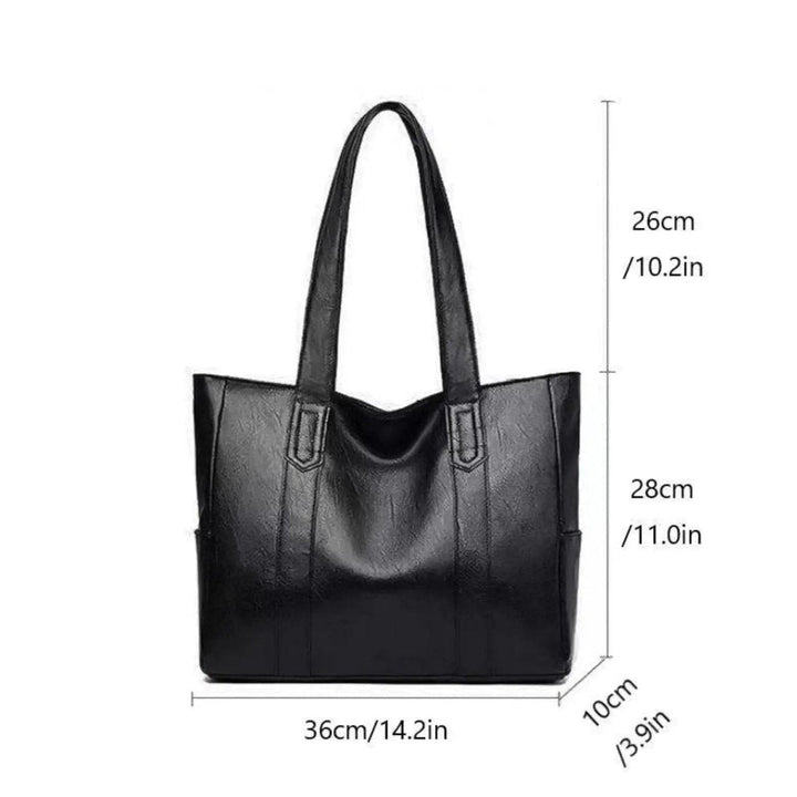 Elegant women's vintage shoulder tote bag, a classic brown everyday accessory for work.