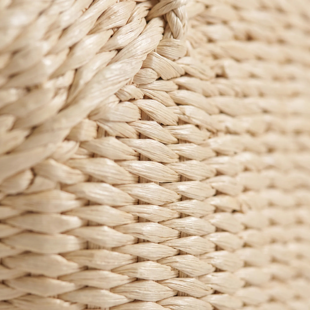 Women's large woven tote bag for summer, styled as a chic beach bag or vacation accessory. Spacious and casual shoulder carry.