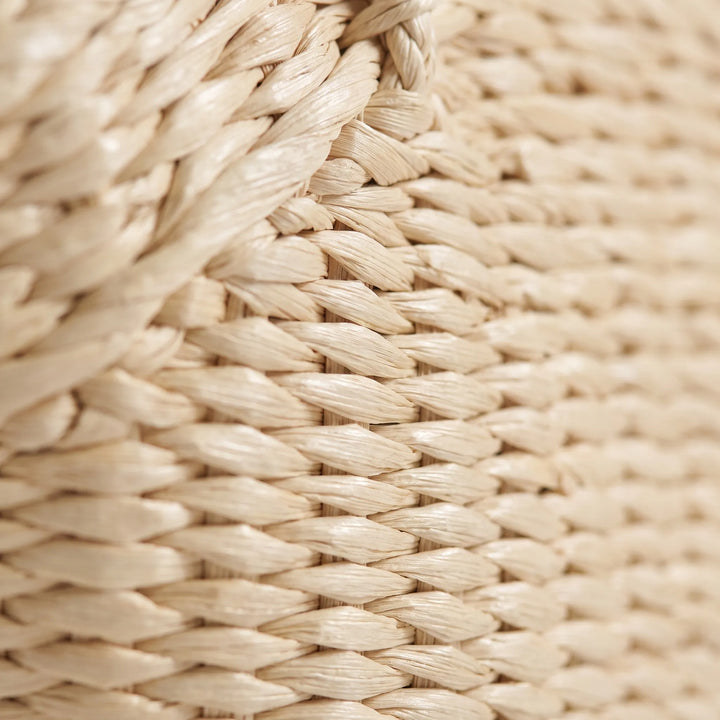 Women's large woven tote bag for summer, styled as a chic beach bag or vacation accessory. Spacious and casual shoulder carry.