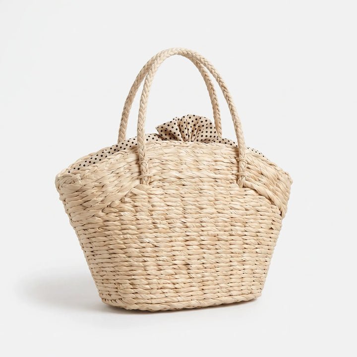 Neutral-colored women's spacious woven tote bag, perfect for daily carry or as a large summer shoulder bag. Stylish & functional.