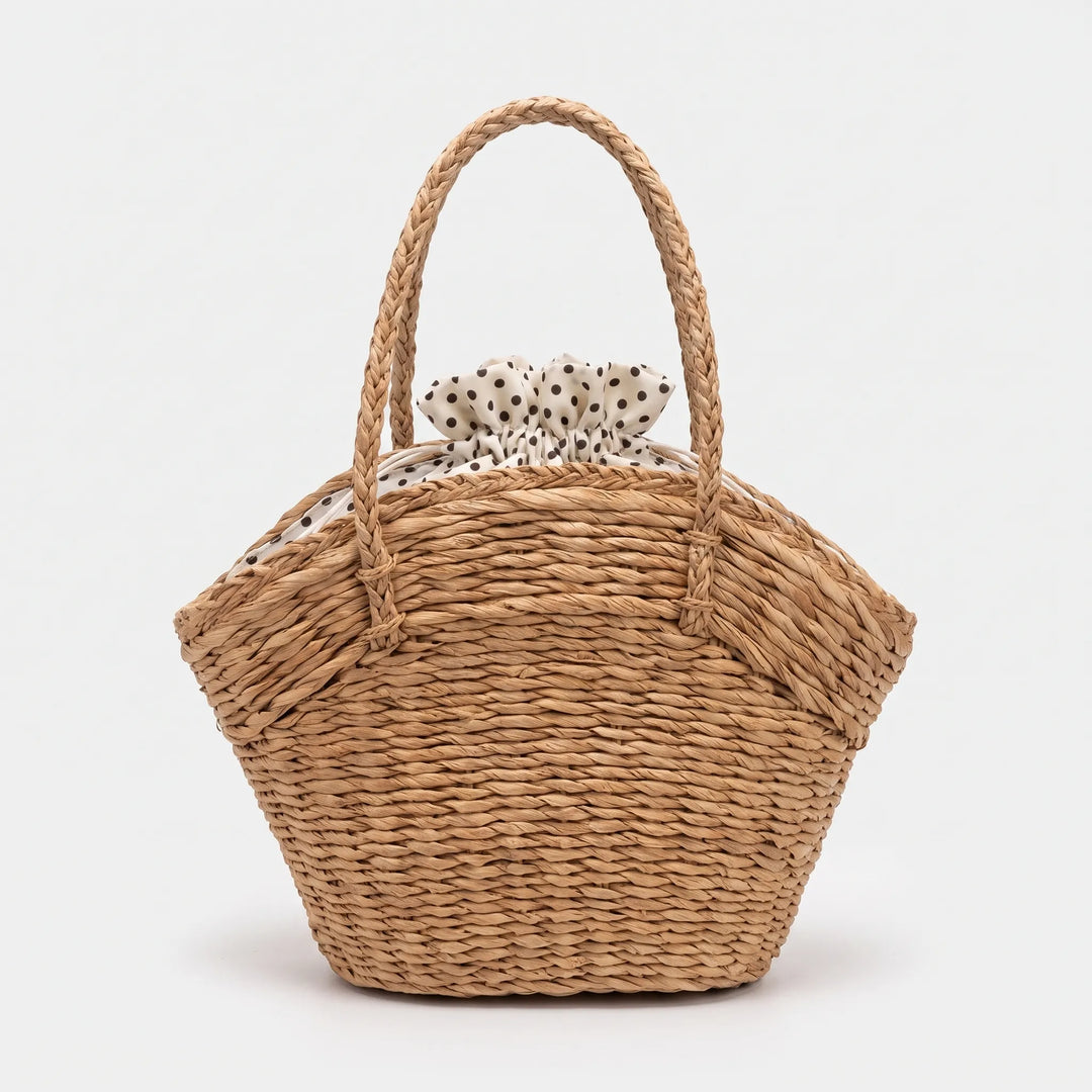 Stylish women's woven summer tote bag with sturdy handles, a versatile casual shoulder bag for beach, travel & daily use.