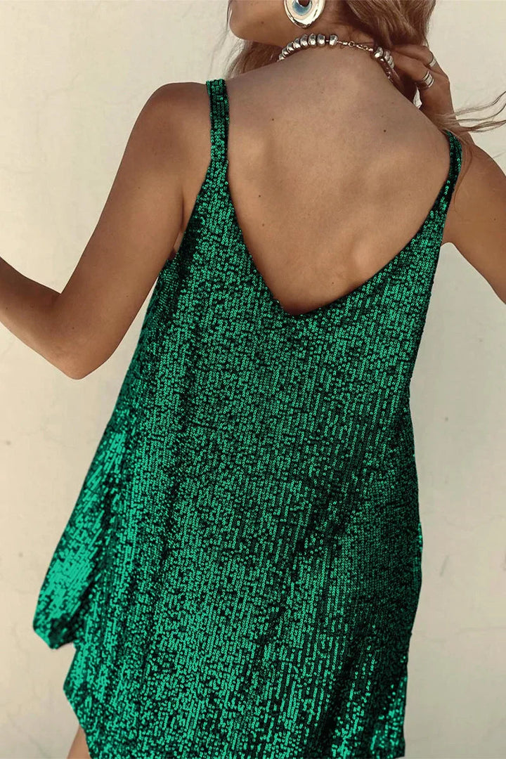Full length view of a dazzling sequin V-neck mini dress.