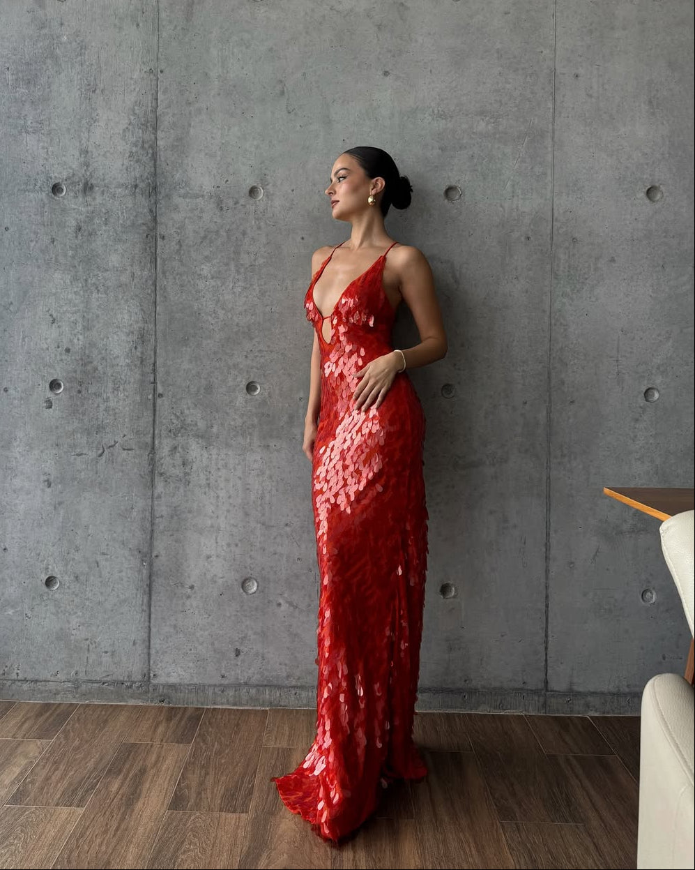 Glamorous women's sequin plunge maxi dress, a sophisticated formal evening gown for homecoming dance.