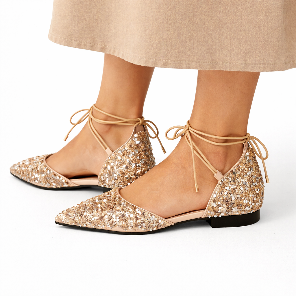Sparkly women's glitter ballet flats with ankle strap and pointed toe, perfect for dressy party elegance.