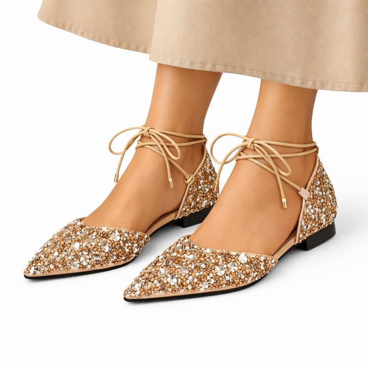 Comfortable women's glitter ankle strap flats with low heel, ideal for parties or elegant daily wear.