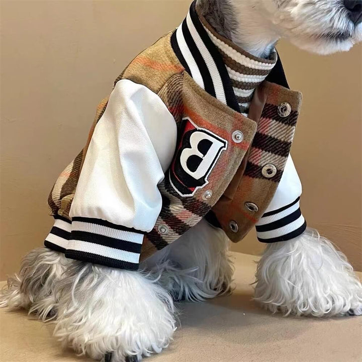 Close-up of dog plaid baseball jacket texture, showcasing quality pet outerwear fabric