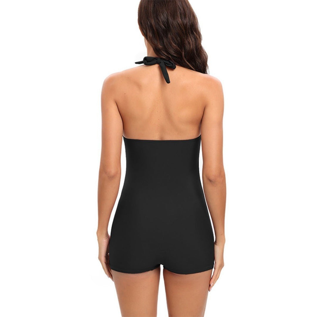 Flattering women's tummy control boyshort one-piece swimsuit, perfect for beach and pool.