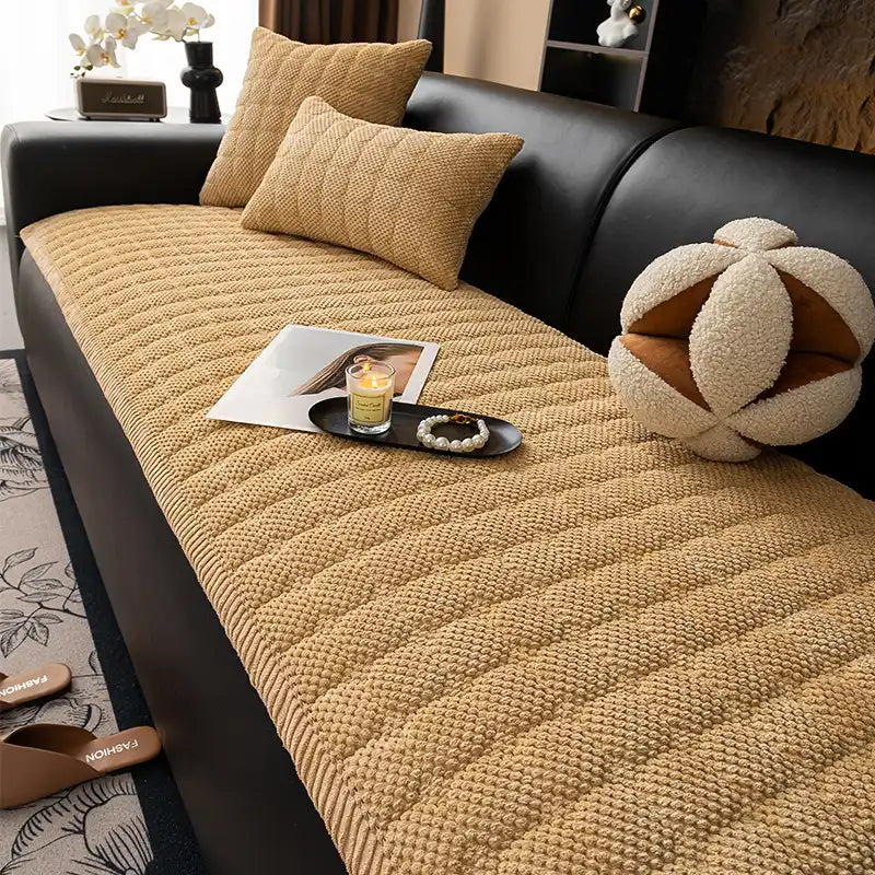 Close-up of soft, durable corduroy fabric on a square pet-friendly sofa cover.