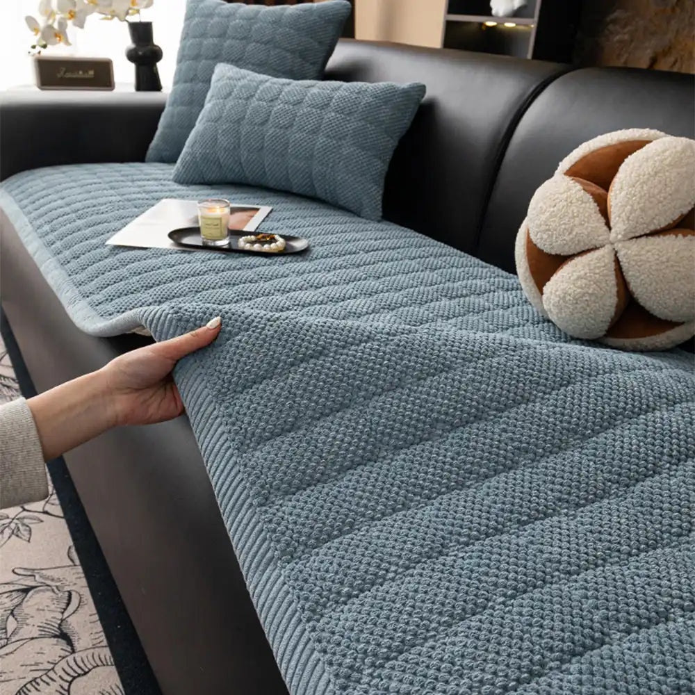 Living room scene with a dog on a square corduroy pet-friendly non-slip couch cover.
