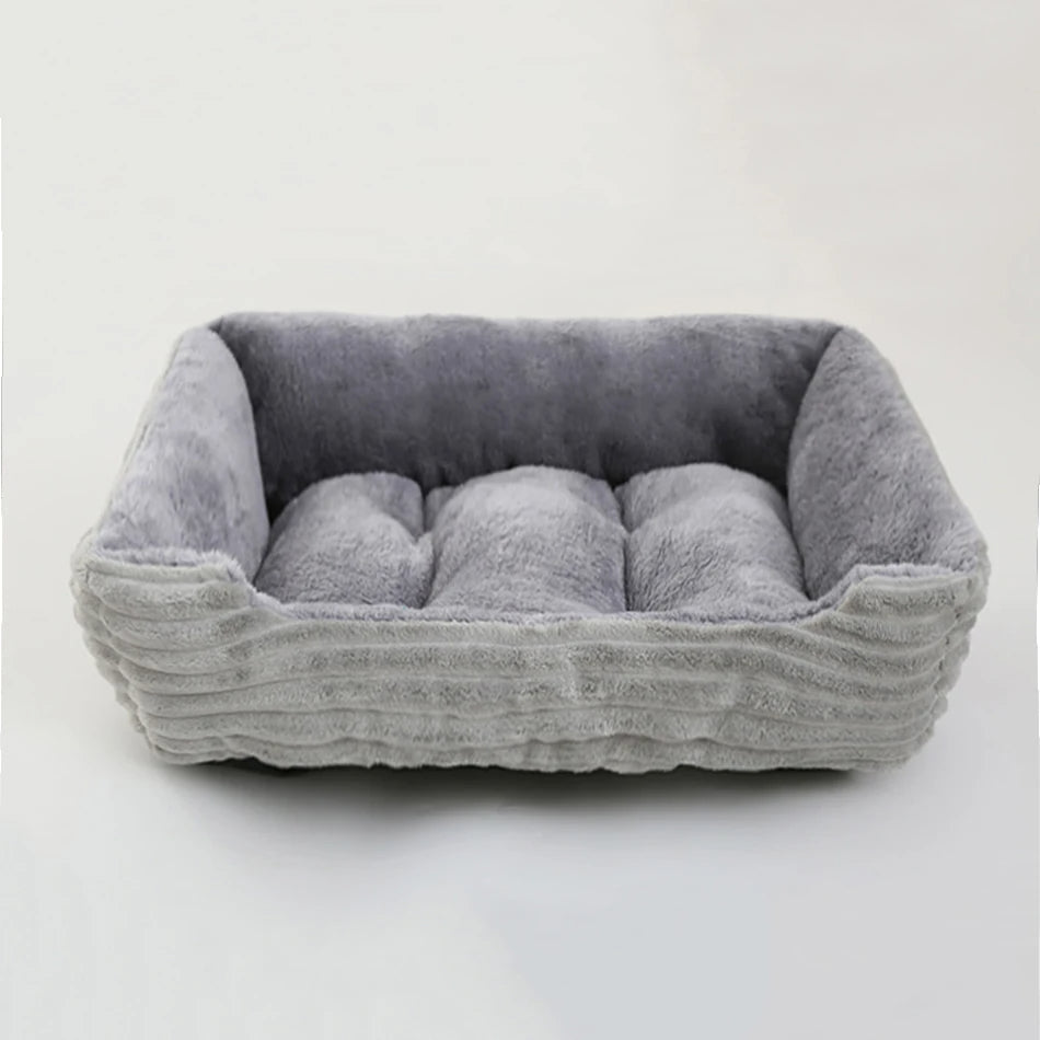 Cozy square calming dog bed, soft plush texture and a protective waterproof oxford fabric