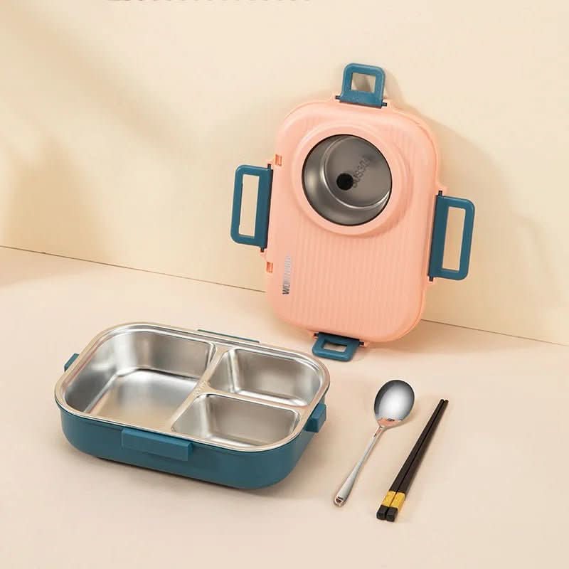 Portable stainless steel 3-compartment lunchbox at a picnic, ideal for outdoor meals & leak-proof transport.