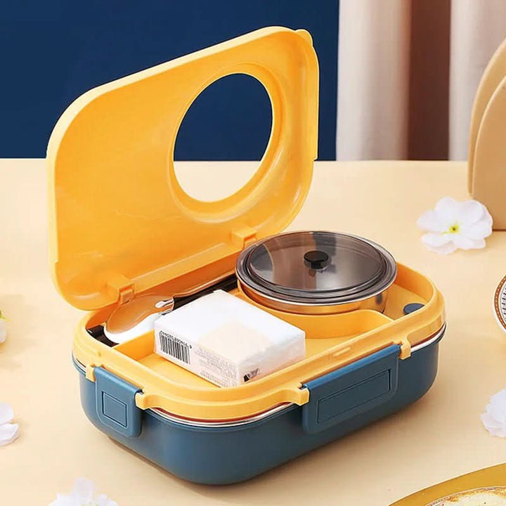 Kid holding a durable stainless steel lunchbox, perfect for school lunches, bento box style.