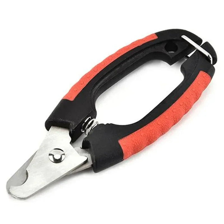 Pet nail clippers for dogs and cats with comfortable grip, essential pet care grooming tool.