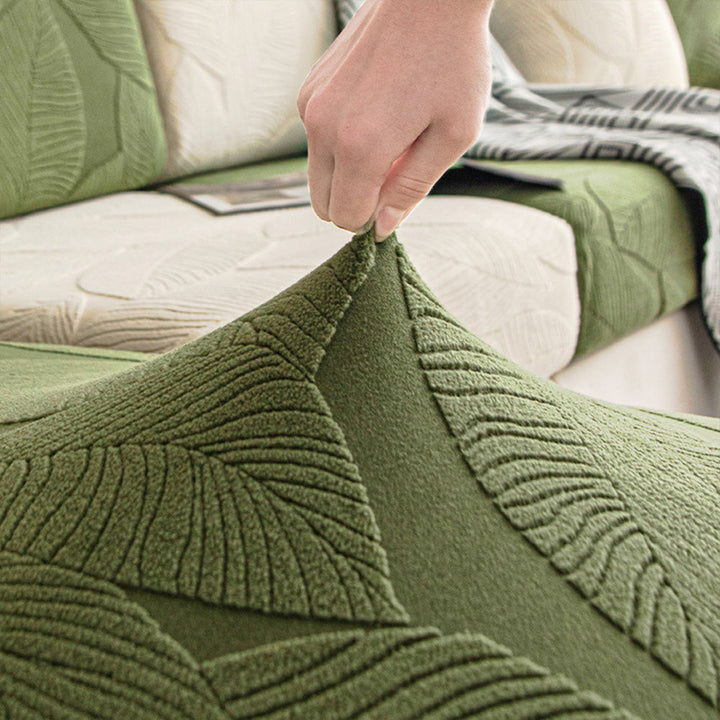 Machine washable stretch sofa slipcover with decorative leaf motif, ideal for busy homes.