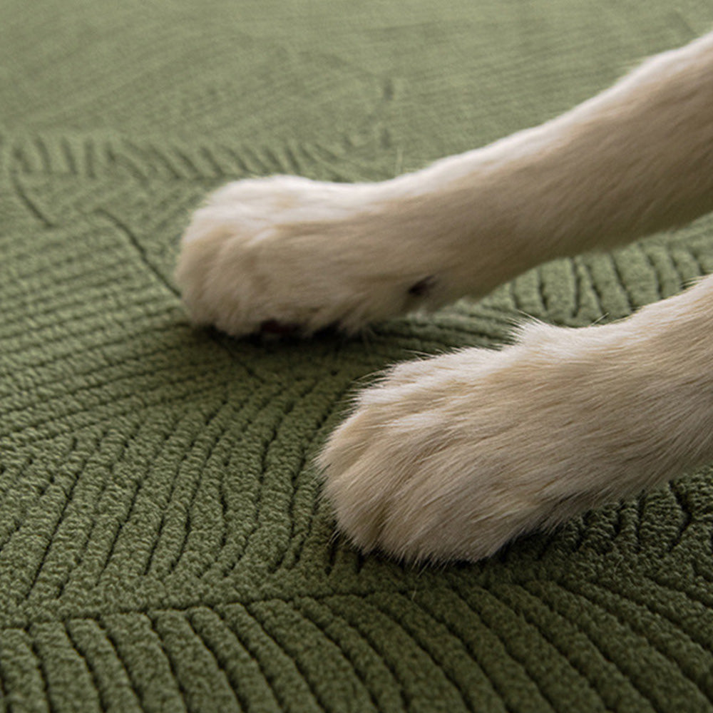 Universal sofa protector with an intricate leaf jacquard weave, designed for pet owners.