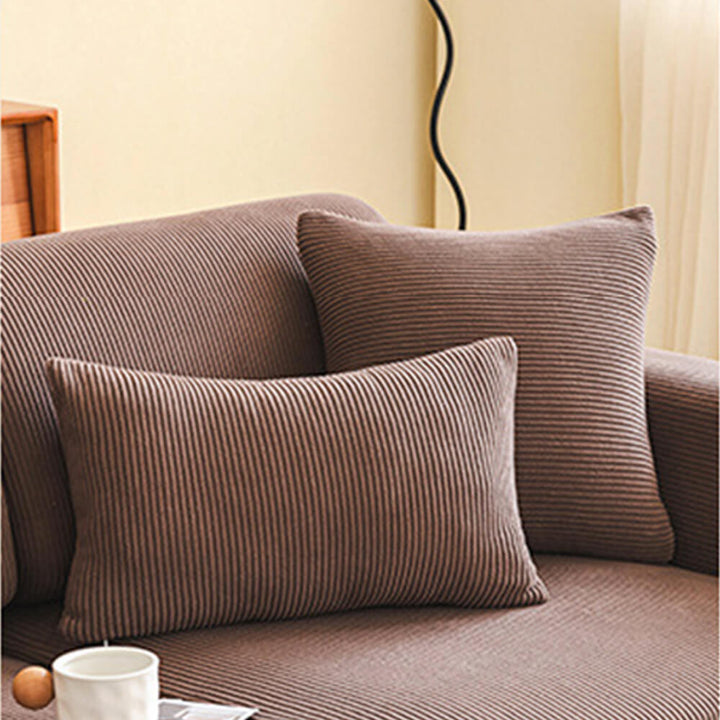 Back view of a stripe corduroy stretch couch cover, ensuring full coverage and a secure fit