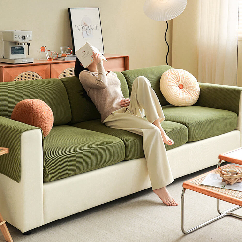 Full coverage stripe corduroy sofa protector, stretching to fit a three-seater couch, pet friendly