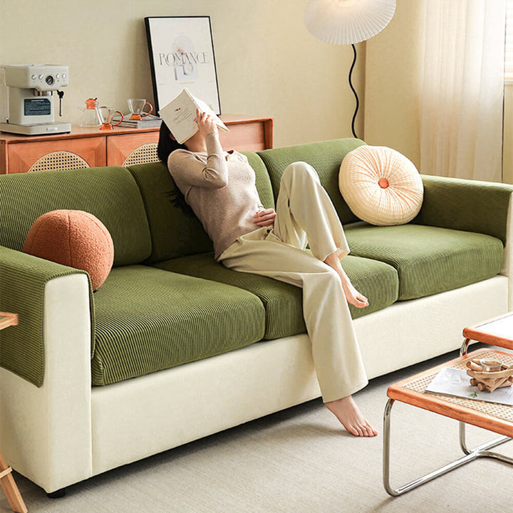 Full coverage stripe corduroy sofa protector, stretching to fit a three-seater couch, pet friendly