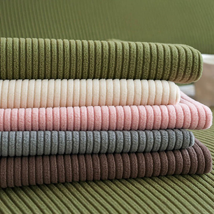 Anti-scratch stripe corduroy sofa cover, highlighting its protection against pet claws and wear