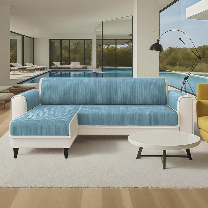 Side view of a striped pet couch cover, illustrating armrest coverage and furniture protection.