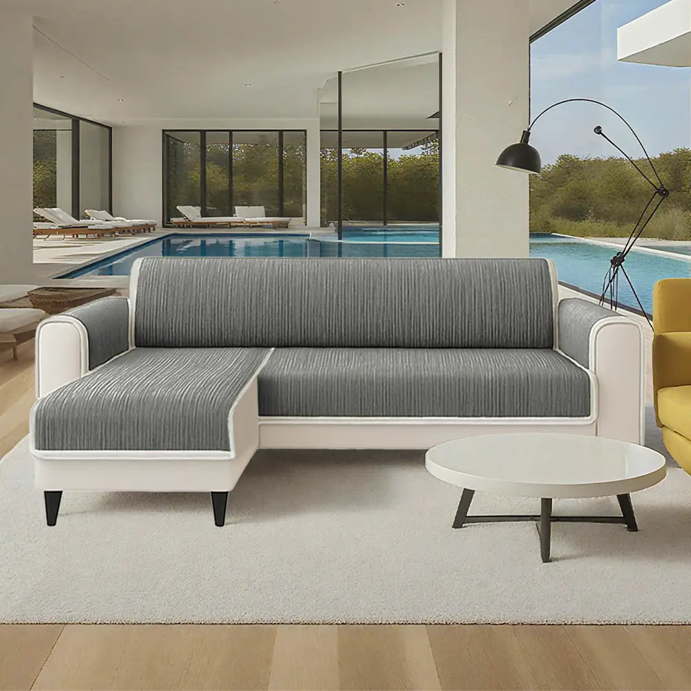 Striped chenille pet couch cover, showing the secure fit over a sofa; anti-slip furniture protector.