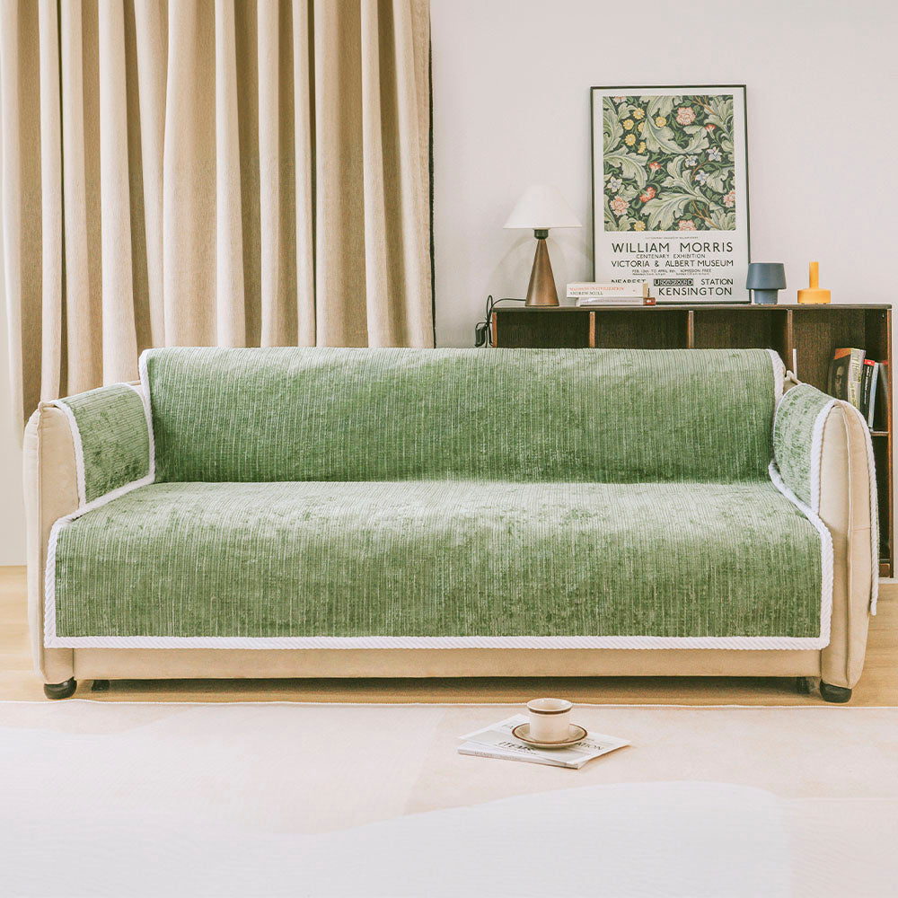 Striped chenille couch cover draped over a sofa, illustrating ease of installation; pet-friendly decor.