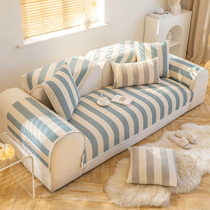 Elegant striped cotton linen sofa cover, providing anti-scratch protection and stylish home decor.