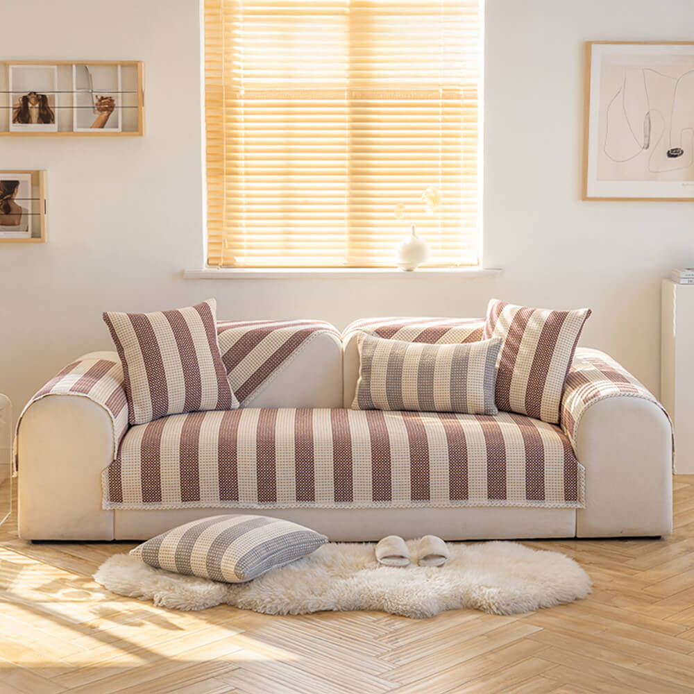 Modern striped cotton linen couch cover, offering anti-scratch furniture protection and style.