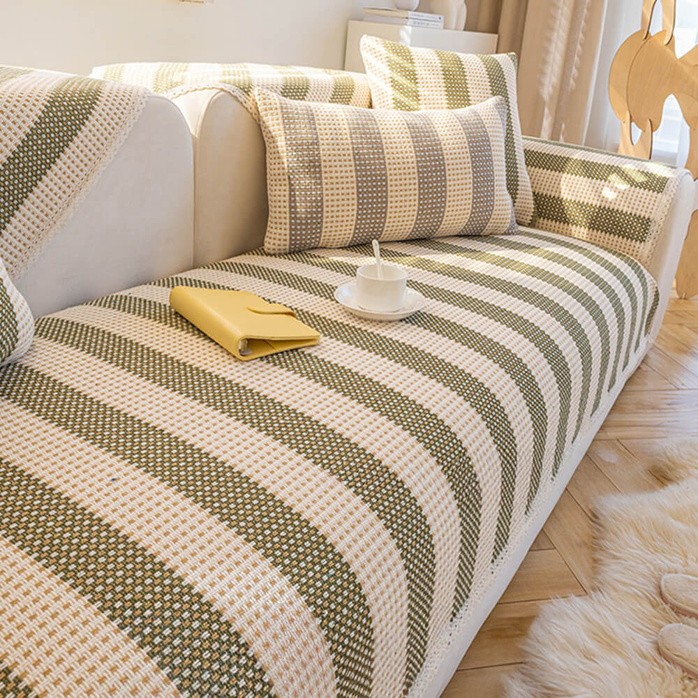 Close-up of striped cotton linen sofa protector fabric, showcasing texture and durable weave.