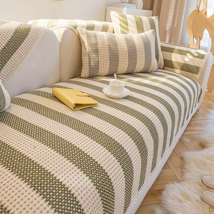 Close-up of striped cotton linen sofa protector fabric, showcasing texture and durable weave.
