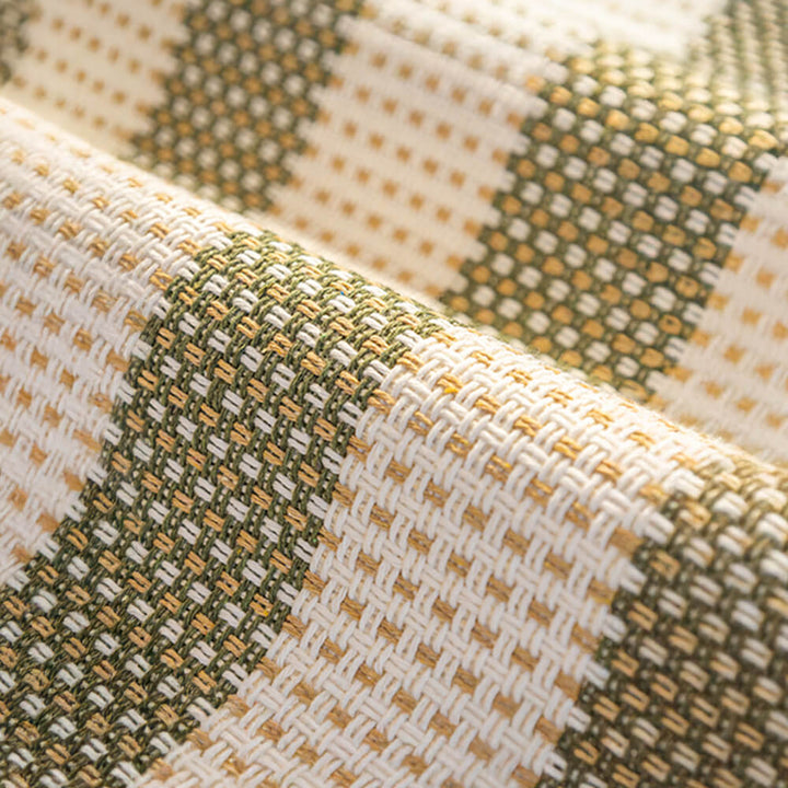 Comfortable striped cotton linen sofa cover, enhancing home decor with furniture protection.