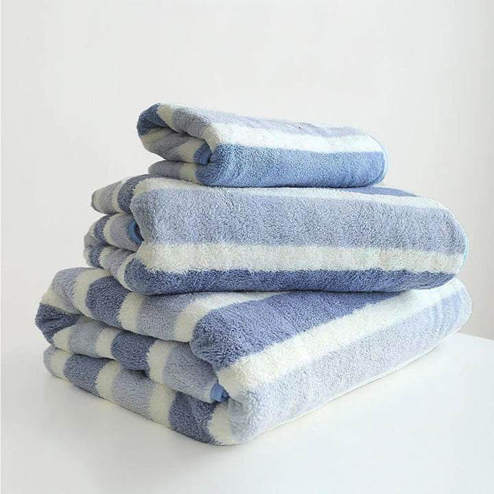 Close-up of striped fast-drying pet towel, showing microfiber texture for quick water absorption