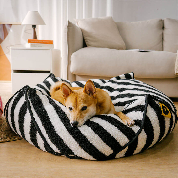 Soft faux lambswool striped bed, calming support for pets, modern dog furniture.