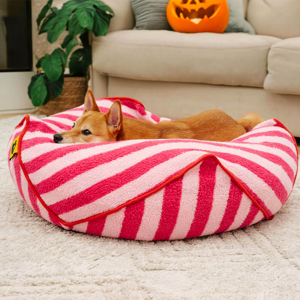 Faux lambswool striped dog bed, polygonal design, therapeutic calming pet comfort.