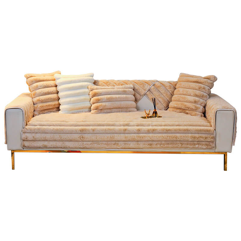 Living room featuring a modern striped non-slip couch cover, a soft and durable home decor item.