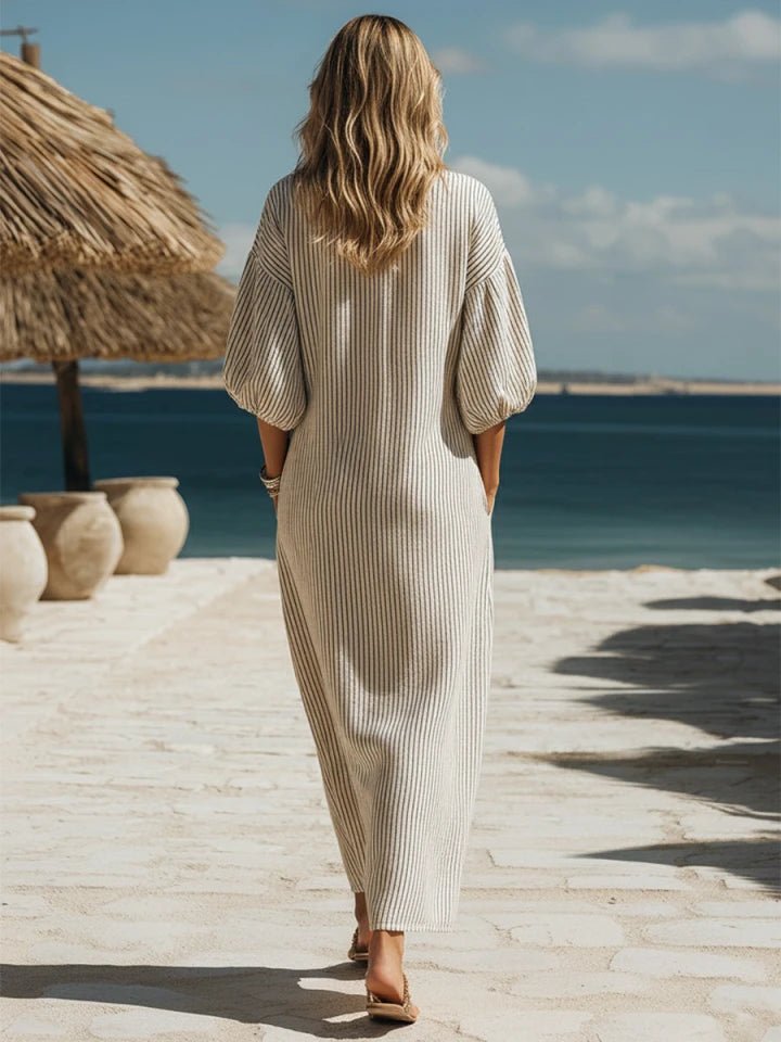 Lightweight striped V-neck maxi dress, puff sleeves & side split. Comfortable summer vacation dress.