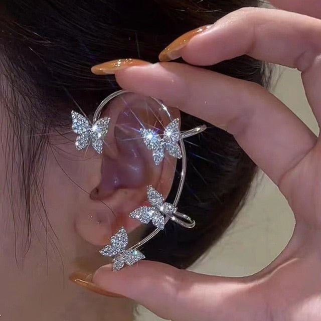 Stylish adjustable clip earrings for women. Elegant, piercing-free gold or silver fashion accessory.