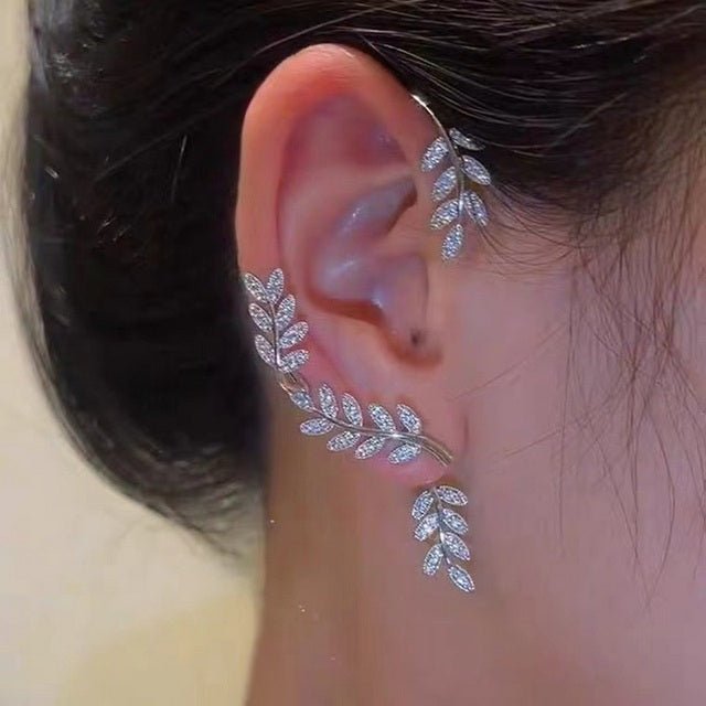 Elegant adjustable clip earrings for women. Stylish, piercing-free gold or silver fashion accessory.