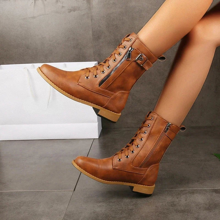 Stylish brown men's lace-up ankle boots with convenient zipper closure for casual or formal wear.