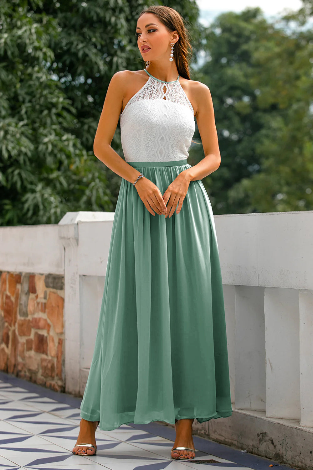 Stunning full-length women's halter maxi dress, an elegant and flowy wedding guest or formal evening gown.