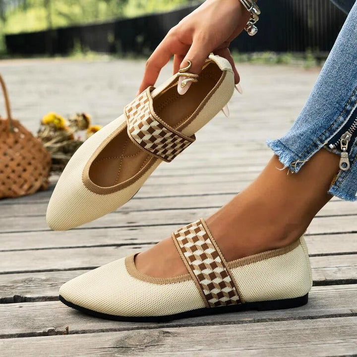 Side view: Elira Women's Orthopedic Slip-On Flats, highlighting supportive arch & comfortable walking design.