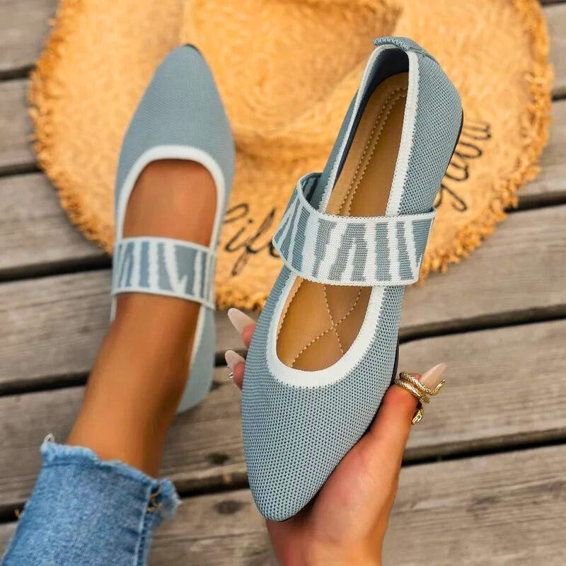 A pair of Elira Women's Orthopedic Slip-On Flats, showcasing sleek design & comfort for daily casual wear.