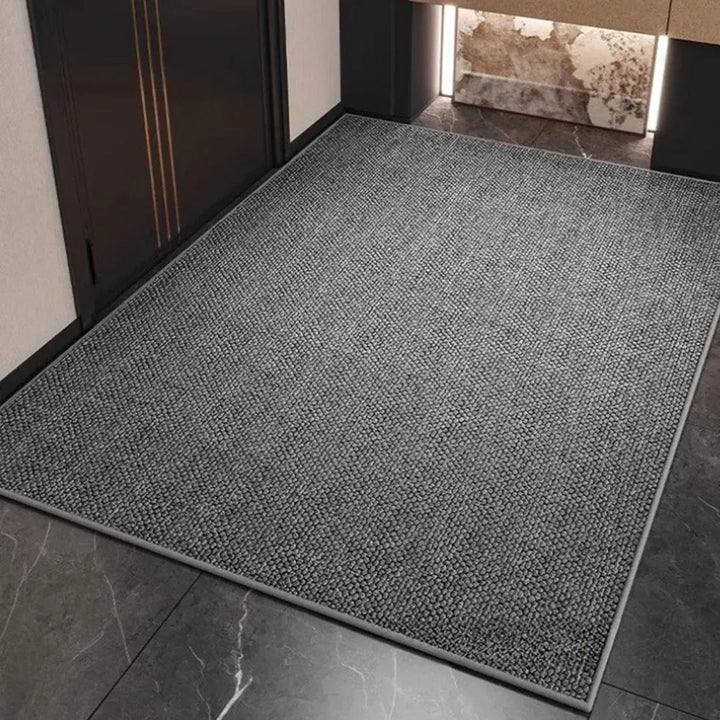 Durable indoor/outdoor entryway mat featuring a stylish geometric pattern, stain-resistant for home decor.
