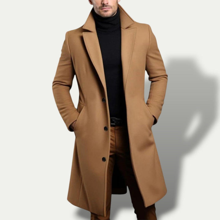 Elegant men's black single breasted long coat. A classic tailored trench coat, ideal for business wear and stylish outfits.