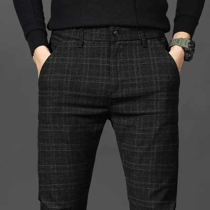 Stylish men's slim fit checked dress trousers, perfect for smart casual office attire or formal events.