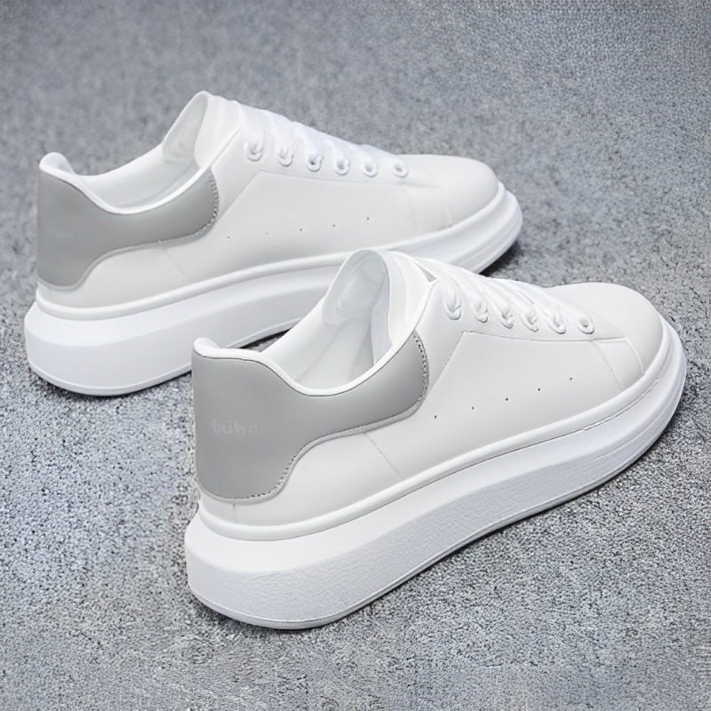 Man wearing comfortable & stylish men's urban sneakers, perfect breathable casual footwear for city life.