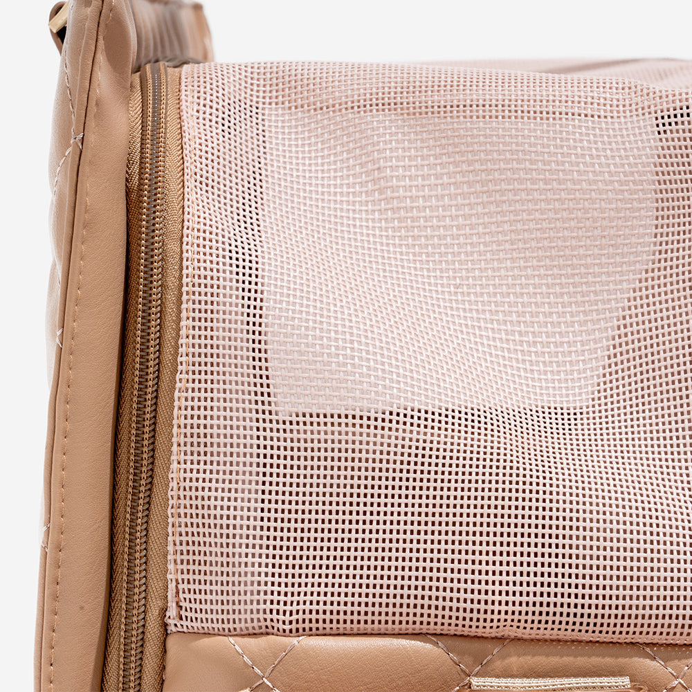 Stylish pet bag for safe and comfortable travel with small dogs or cats.
