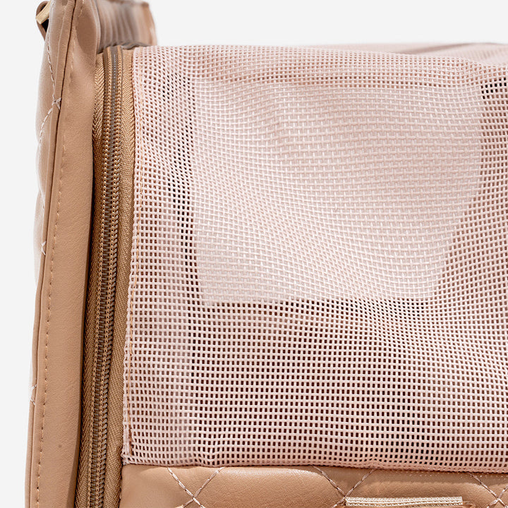 Stylish pet bag for safe and comfortable travel with small dogs or cats.